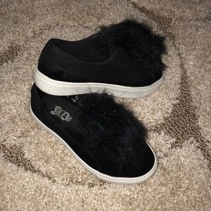 Girls slide in shoes